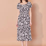 Robe Victoria feuilles noir et ivoire par Cherry Bobin