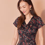Robe Éléonore fleuri rouge fond noir par Cherry Bobin