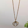 Collier coquillage or de Roxy Lama