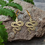 Boucles d'oreilles serpent or ou argent de Roxy Lama