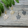 Boucles d'oreilles serpent or ou argent de Roxy Lama