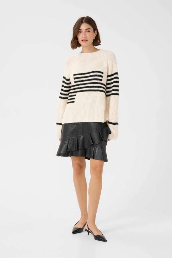Chandail Nicky Kimmy rayures noir et blanc par Culture