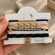 Lot de 4 Bracelet élastiques à cheveux noir gold de Tokade