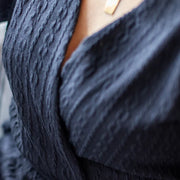 Cardigan à cordes noir de Louve