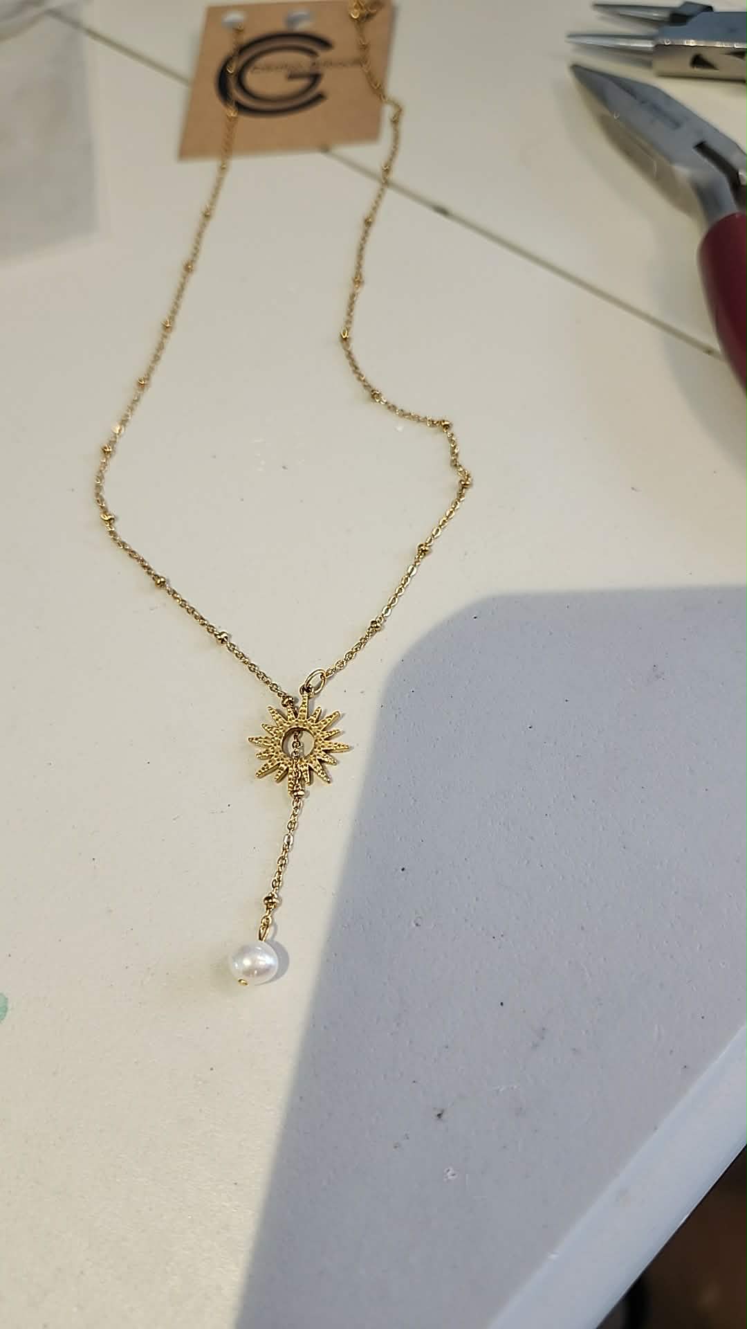 Collier étoile et perle #720 de Gribouille