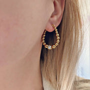 Boucles d'oreilles Shelly dorées de Tokade