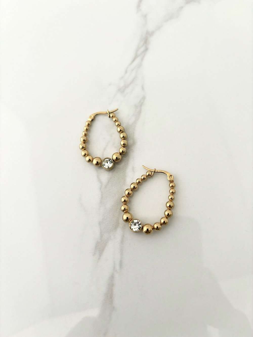 Boucles d'oreilles Shelly dorées de Tokade
