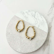 Boucles d'oreilles Shelly dorées de Tokade