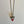 Collier triangle rouge par La voleuse de triangles